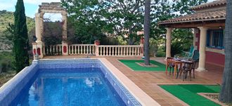 Casa con piscina y jardín sin vecinos en Llutxent en Llutxent, espacio para eventos por horas